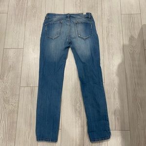 Light wash distressed skinny jeans